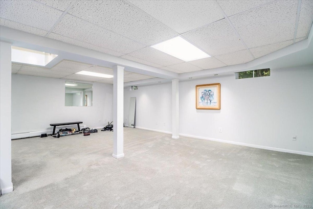 10 Hundred Acres Rd, Newtown, CT 06470 - finished basement featuring a paneled ceiling, carpet floors, and baseboards