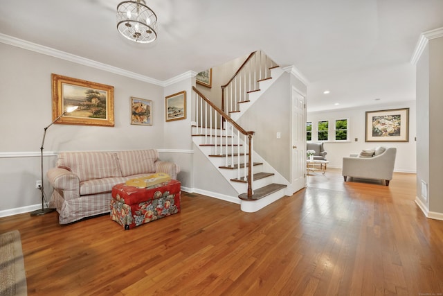 177 S Ave Unit 6, New Canaan, CT 06840 - living room with wood finished floors, stairs, crown molding, baseboards, and recessed lighting