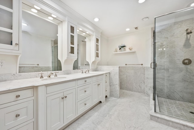 177 S Ave Unit 6, New Canaan, CT 06840 - full bath with crown molding, double vanity, a marble finish shower, recessed lighting, and marble finish flooring