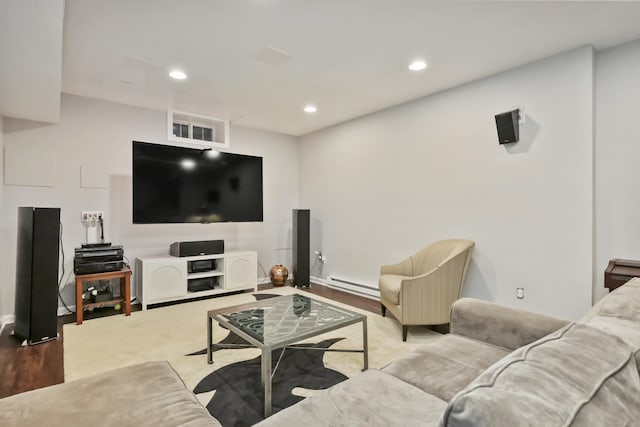 177 S Ave Unit 6, New Canaan, CT 06840 - living room featuring a baseboard radiator, recessed lighting, and wood finished floors