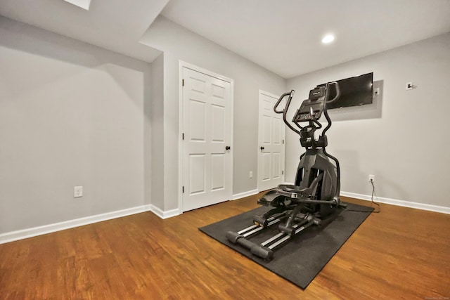 177 S Ave Unit 6, New Canaan, CT 06840 - workout area with wood finished floors, baseboards, and recessed lighting