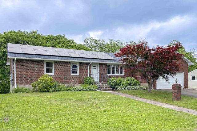 92 Milardo Ln, Middletown, CT 06457 - single story home with brick siding, roof mounted solar panels, and a front lawn
