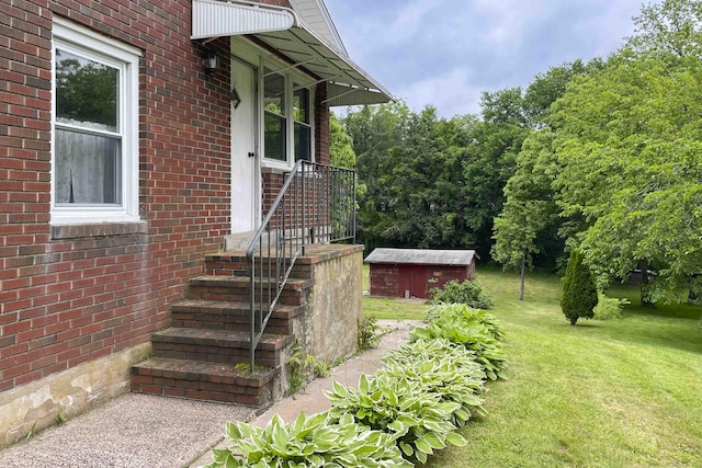 92 Milardo Ln, Middletown, CT 06457 - property entrance featuring a yard and brick siding