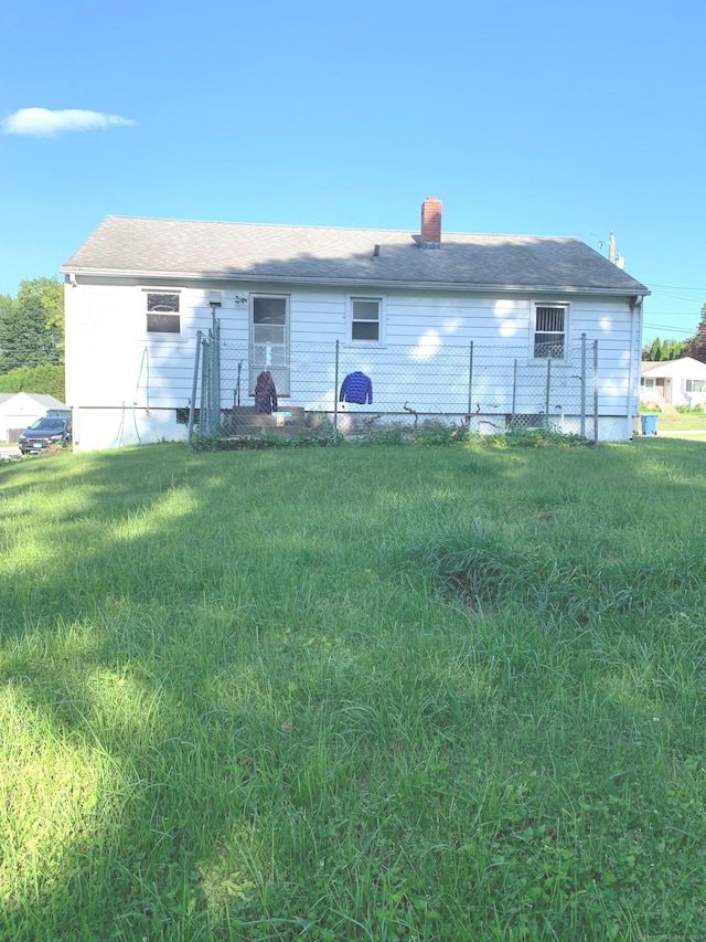 9 Hillcrest Ave, Ledyard, CT 06339 - rear view of property with a lawn and a chimney