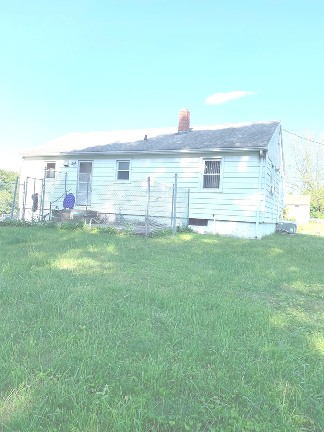 9 Hillcrest Ave, Ledyard, CT 06339 - back of property featuring a chimney