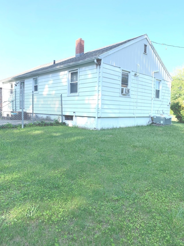 9 Hillcrest Ave, Ledyard, CT 06339 - rear view of property featuring a chimney, central AC, and cooling unit