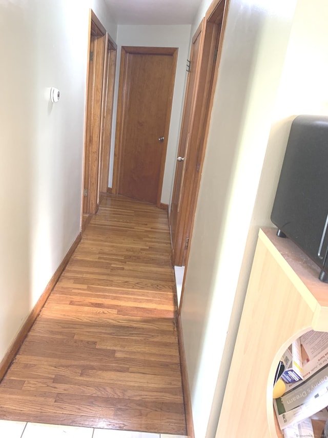 9 Hillcrest Ave, Ledyard, CT 06339 - hall with light wood-style floors and baseboards