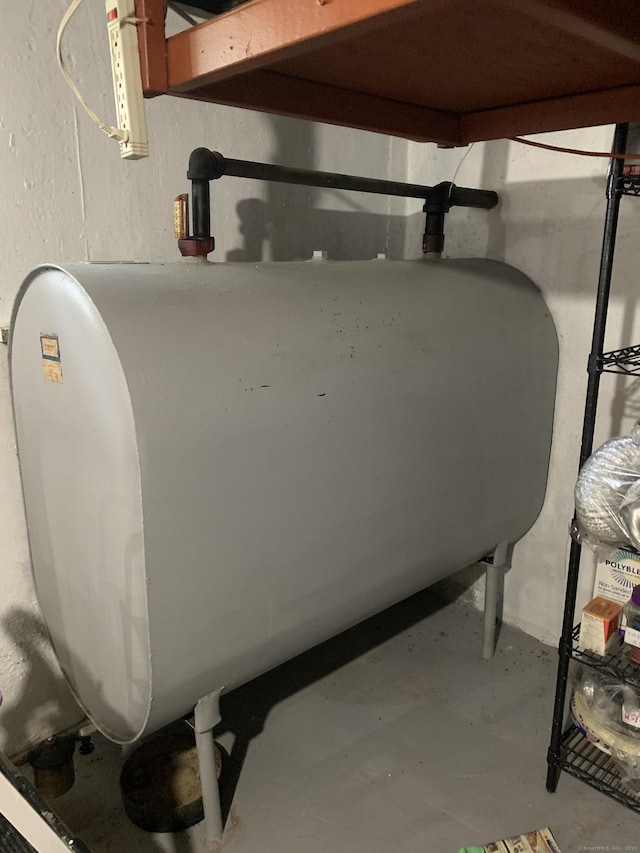 9 Hillcrest Ave, Ledyard, CT 06339 - basement view of heating fuel and concrete flooring