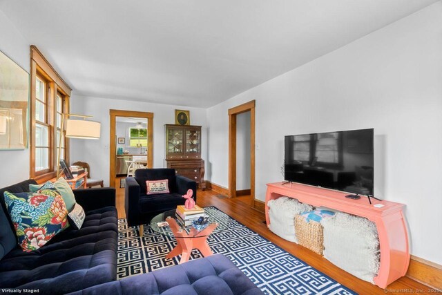 145 Main St, Essex, CT 06442 - living area featuring wood finished floors and baseboards