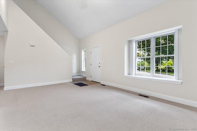 25 Briar Ln Unit 25, Norwich, CT 06360 - foyer with carpet floors, baseboards, and lofted ceiling