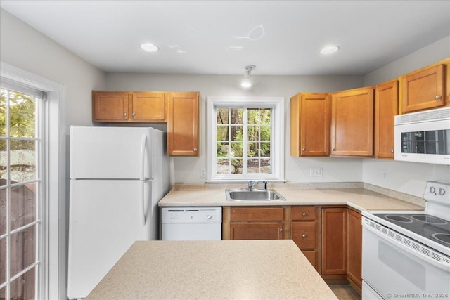 25 Briar Ln Unit 25, Norwich, CT 06360 - kitchen featuring white appliances, a sink, healthy amount of natural light, light countertops, and recessed lighting