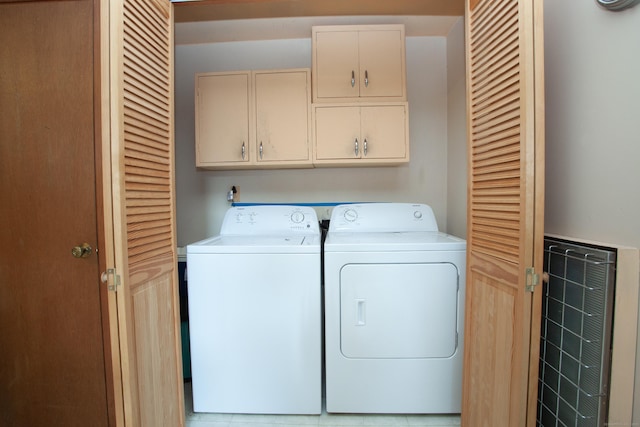 6 Cadwell St, West Hartford, CT 06107 - laundry area featuring washing machine and dryer and cabinet space