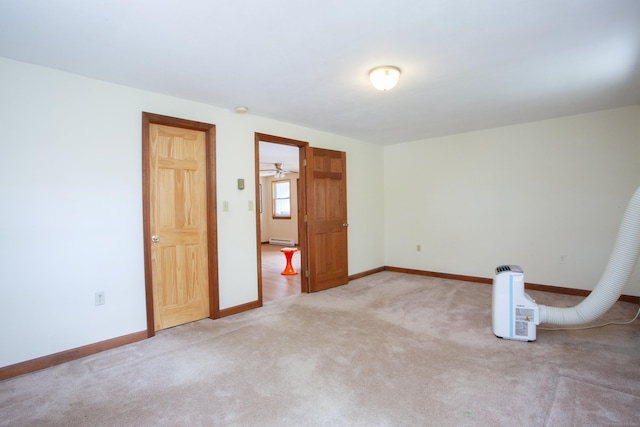 6 Cadwell St, West Hartford, CT 06107 - spare room with a baseboard radiator and light colored carpet