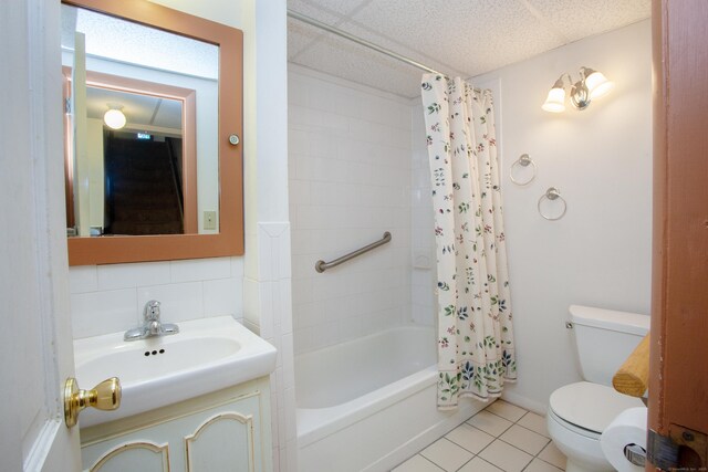 6 Cadwell St, West Hartford, CT 06107 - bathroom featuring vanity, tile patterned floors, shower / bathtub combination with curtain, and tasteful backsplash