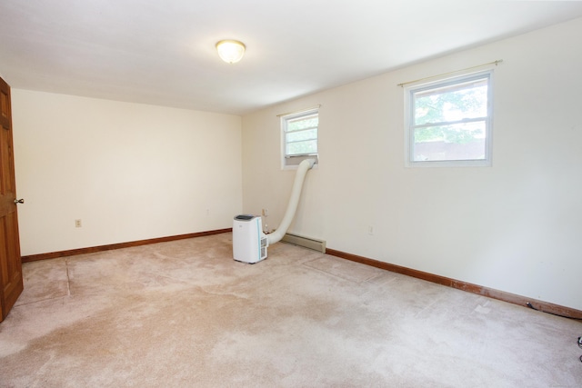 6 Cadwell St, West Hartford, CT 06107 - basement featuring light colored carpet and a baseboard heating unit