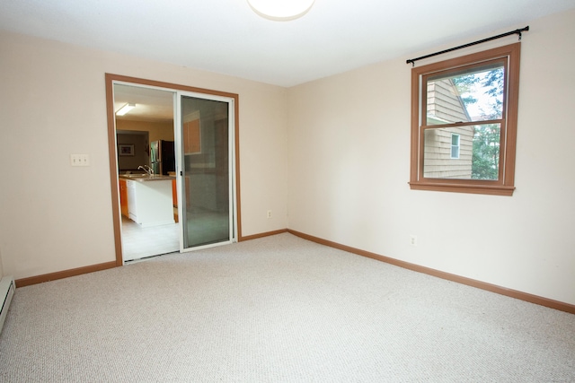 6 Cadwell St, West Hartford, CT 06107 - spare room featuring light carpet and baseboard heating