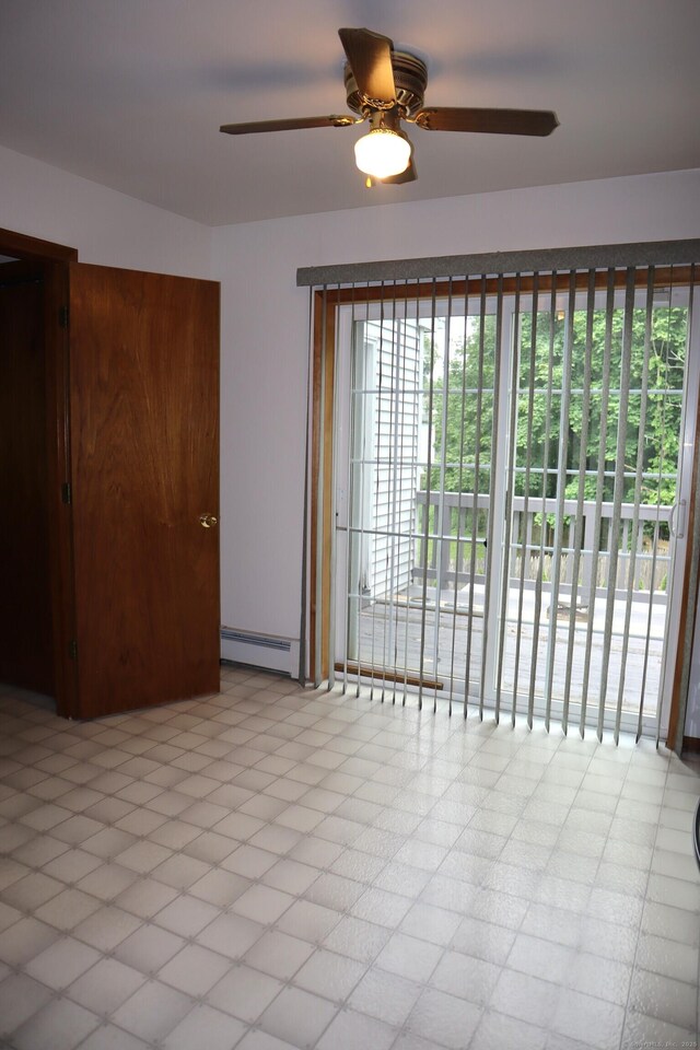 155 Jackson St, Ansonia, CT 06401 - unfurnished room featuring a baseboard radiator and ceiling fan
