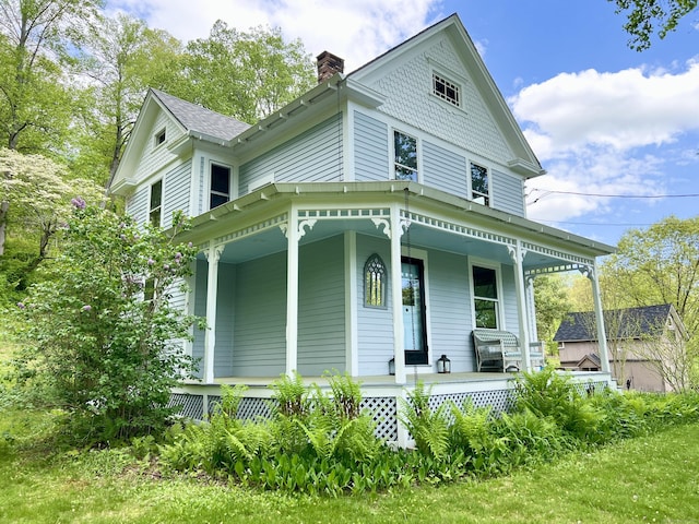 70 River Rd, East Haddam, CT 06423 - victorian home featuring covered porch and a chimney