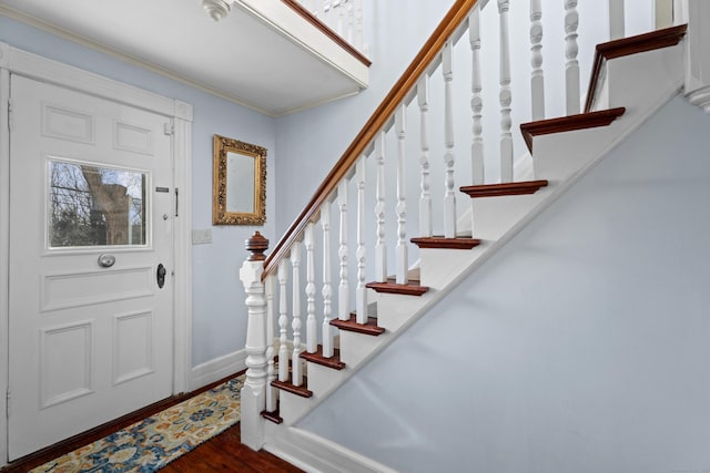 70 River Rd, East Haddam, CT 06423 - entryway featuring wood finished floors, crown molding, stairway, and baseboards