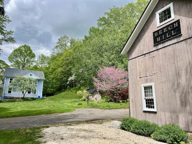 70 River Rd, East Haddam, CT 06423 - view of side of home with a yard