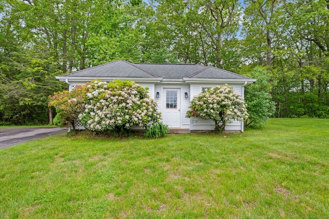 184 Fern Ave, Litchfield, CT 06759 - view of side of property with a lawn and a shingled roof