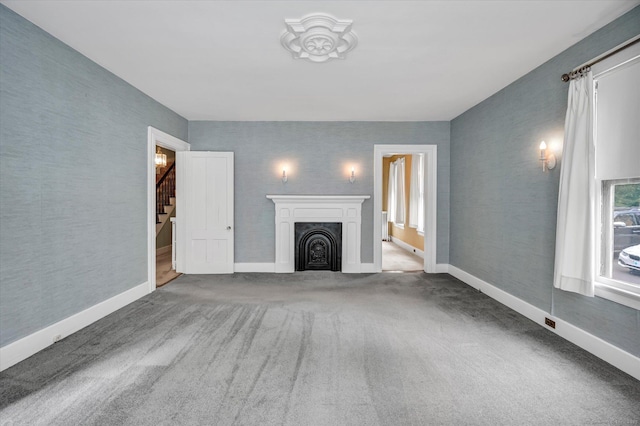 44 Maple Ave, Canton, CT 06019 - unfurnished living room featuring stairs, carpet flooring, a fireplace, and baseboards