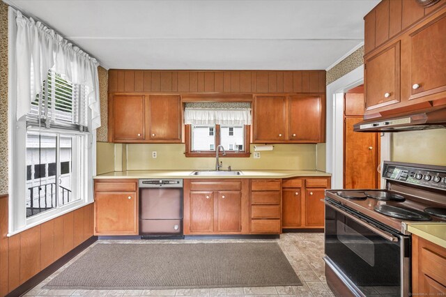 44 Maple Ave, Canton, CT 06019 - kitchen featuring range with electric stovetop, dishwasher, a sink, light countertops, and brown cabinets