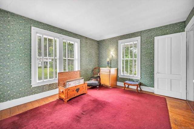 44 Maple Ave, Canton, CT 06019 - living area featuring wallpapered walls, hardwood / wood-style floors, healthy amount of natural light, and baseboards
