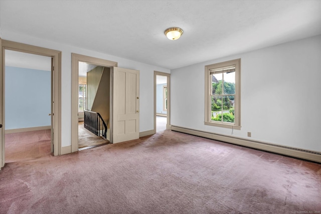 44 Maple Ave, Canton, CT 06019 - carpeted spare room featuring a baseboard heating unit and baseboards