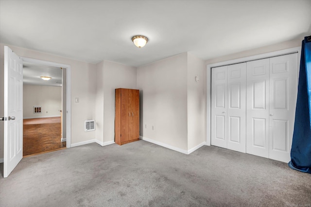 44 Maple Ave, Canton, CT 06019 - unfurnished bedroom featuring carpet, baseboards, and a closet