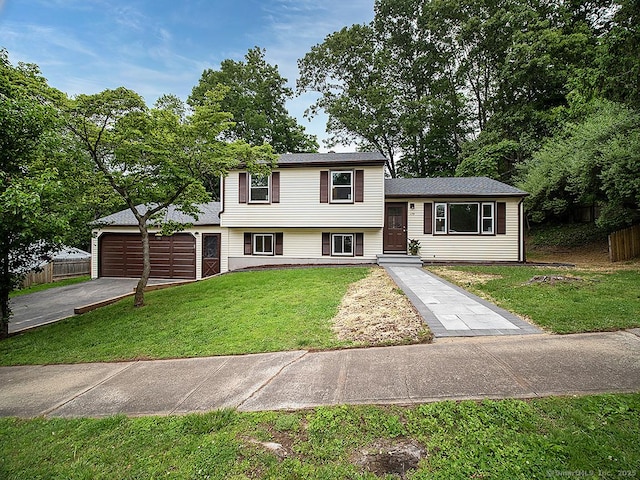 179 Anns Farm Rd, Hamden, CT 06518 - split level home with driveway and a garage