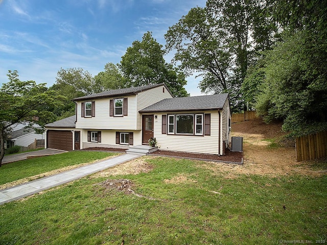 179 Anns Farm Rd, Hamden, CT 06518 - tri-level home with central AC, a garage, and driveway