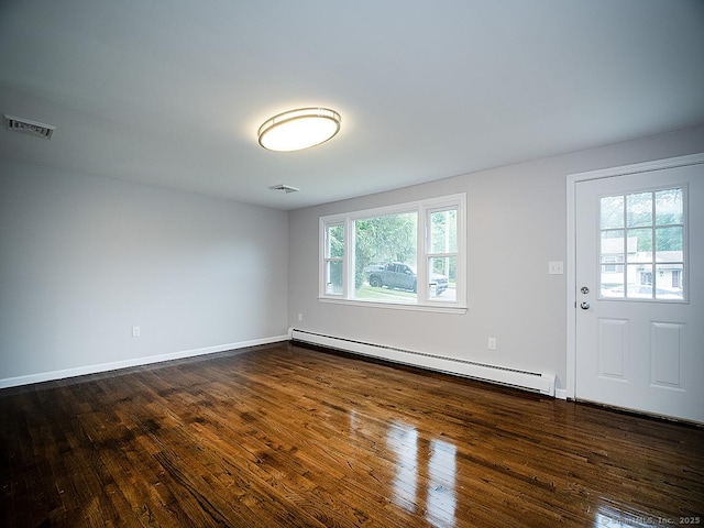 179 Anns Farm Rd, Hamden, CT 06518 - empty room with a baseboard radiator, dark wood-style floors, and baseboards