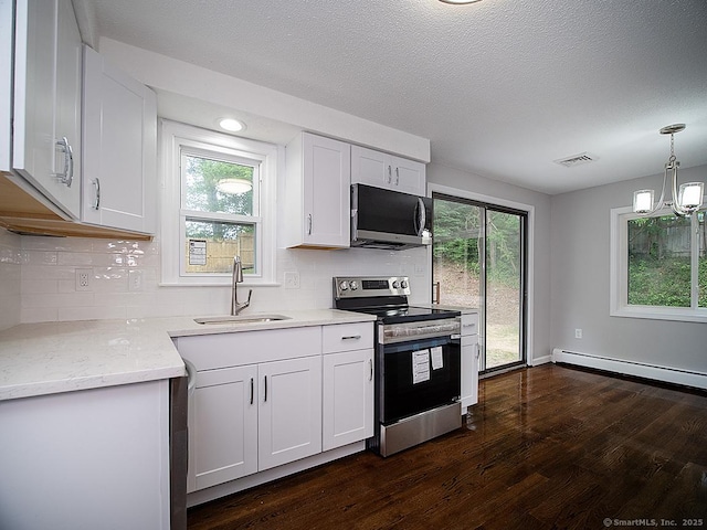 179 Anns Farm Rd, Hamden, CT 06518 - kitchen featuring stainless steel appliances, a sink, baseboard heating, dark wood-style floors, and tasteful backsplash