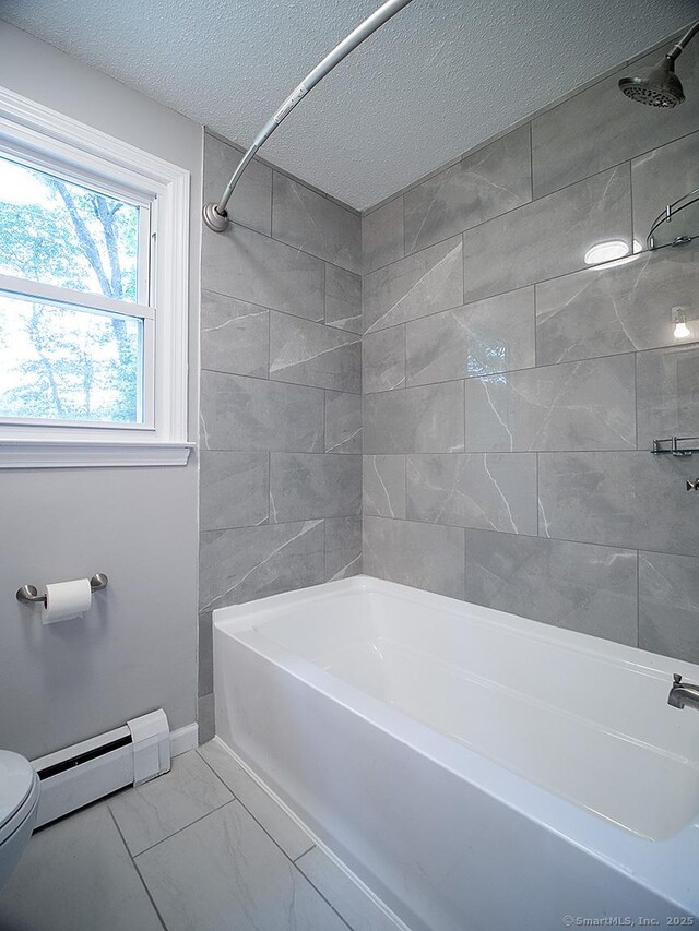 179 Anns Farm Rd, Hamden, CT 06518 - full bathroom with baseboard heating, toilet, washtub / shower combination, a textured ceiling, and marble look tiles