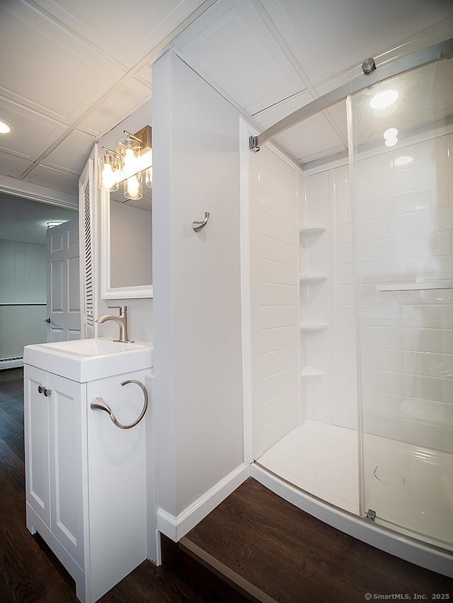 179 Anns Farm Rd, Hamden, CT 06518 - full bath with wood finished floors, baseboards, vanity, walk in shower, and recessed lighting