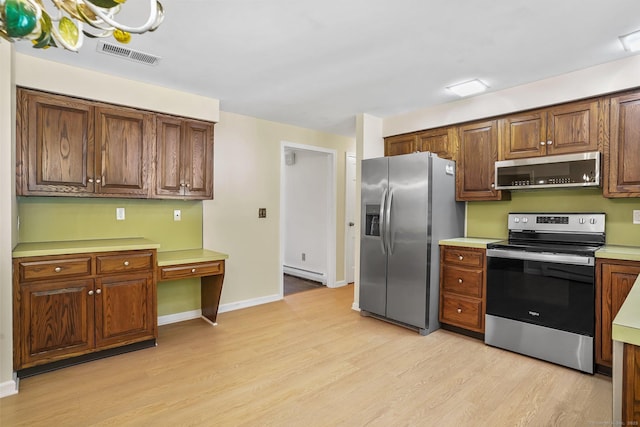 27 Kitcher Ct, Trumbull, CT 06611 - kitchen featuring appliances with stainless steel finishes, light wood-style flooring, a baseboard radiator, light countertops, and baseboards