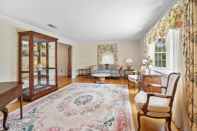 27 Kitcher Ct, Trumbull, CT 06611 - sitting room with ornamental molding, wood finished floors, and baseboards
