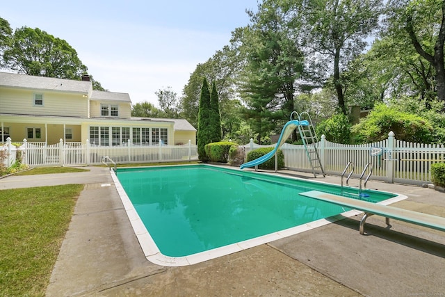 27 Kitcher Ct, Trumbull, CT 06611 - view of swimming pool featuring a water slide, a patio area, and a diving board