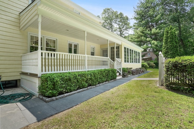 27 Kitcher Ct, Trumbull, CT 06611 - view of side of home with a lawn and a porch
