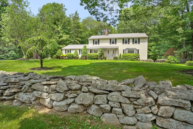 27 Kitcher Ct, Trumbull, CT 06611 - colonial house with a chimney and a front yard