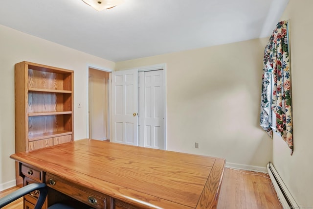 27 Kitcher Ct, Trumbull, CT 06611 - office space featuring a baseboard radiator, light wood-style flooring, and baseboards