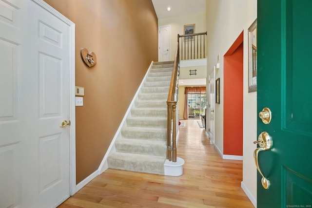 156 Governor Trumbull Way Unit 156, Trumbull, CT 06611 - foyer entrance featuring light wood finished floors and stairs