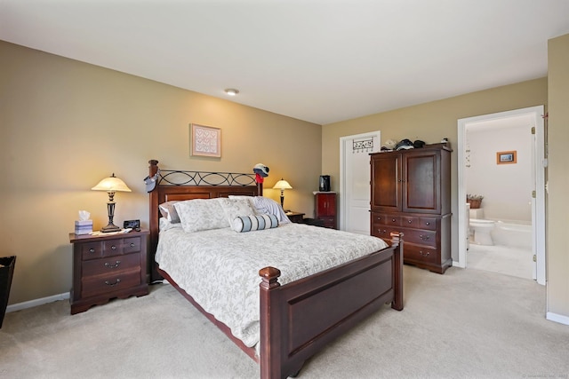 156 Governor Trumbull Way Unit 156, Trumbull, CT 06611 - bedroom with light colored carpet and ensuite bath