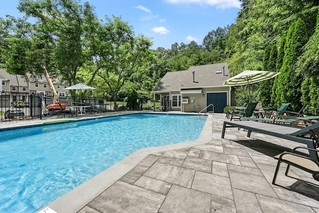156 Governor Trumbull Way Unit 156, Trumbull, CT 06611 - view of swimming pool featuring a patio area and view of scattered trees