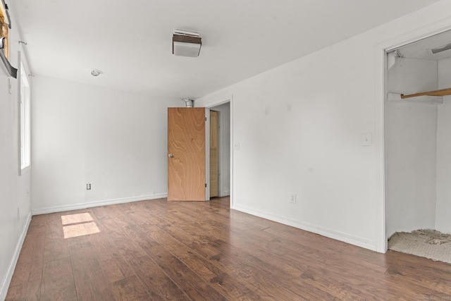 231 Broad St, Norwich, CT 06360 - unfurnished bedroom featuring wood-type flooring, baseboards, and a closet