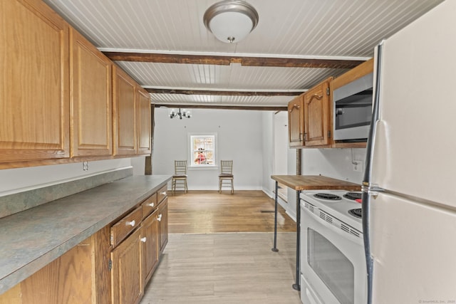 231 Broad St, Norwich, CT 06360 - kitchen with white appliances, light wood-style flooring, wood ceiling with exposed beams, dark countertops, and brown cabinetry
