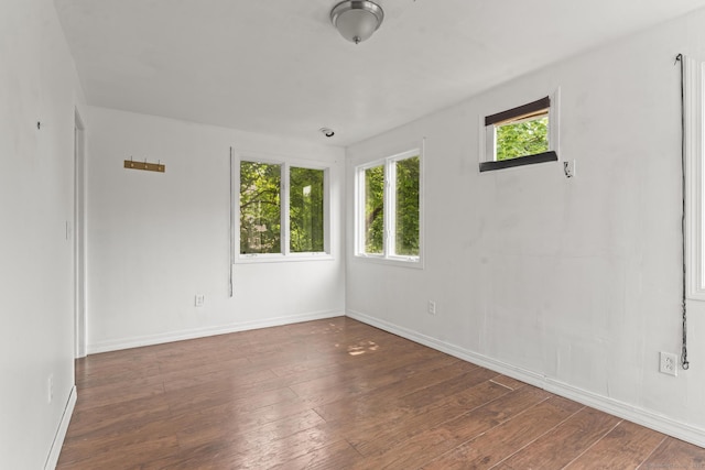 231 Broad St, Norwich, CT 06360 - spare room with hardwood / wood-style flooring and baseboards