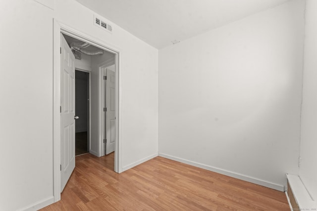 231 Broad St, Norwich, CT 06360 - unfurnished room with light wood-style flooring and baseboards