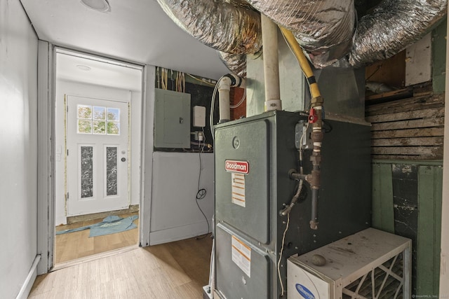 231 Broad St, Norwich, CT 06360 - utility room with electric panel and heating unit
